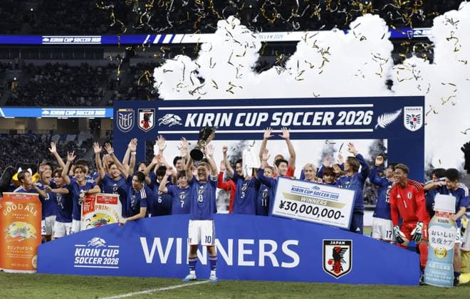 Football: Kirin Cup Japan players celebrate after winning the Kirin Cup football title with a 2-1 victory over New Zealand in the cup final at MUFG Stadium in Tokyo on Oct. 5, 2026.  A14AA0005630200P