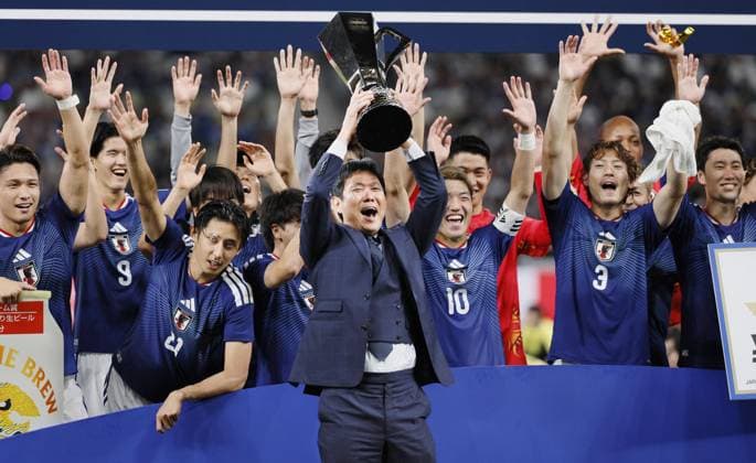 Football: Kirin Cup Japan head coach Hajime Moriyasu (C) and his players celebrate after winning the Kirin Cup football title with a 2-1 victory over New Zealand in the cup final at MUFG Stadium in Tokyo on Oct. 5, 2026.  A14AA0005630202P
