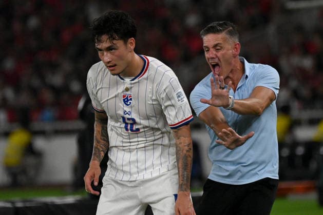 (261005) -- JAKARTA, Oct. 5, 2026 -- John Herdman (R), head coach of Indonesia, reacts during the FIFA ASEAN Cup 2026 Division 1 Final Match between Indonesia and Thailand at Gelora Bung Karno Stadium in Jakarta, Indonesia, Oct. 5, 2026. ) (SP)INDONESIA-JAKARTA-FOOTBALL-FIFA ASEAN CUP 2026-DIVISION 1-FINAL-INDONESIA VS THAILAND AgungxKuncahyaxB. 