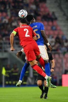 Zeki Celik of Turkiye and Issa Doumbia of Italy compete for the ball during the Nations League football match between Italy and Turkiye at Renato Dall Ara stadium in Bologna (Italy), October 5, 2026. AndreaxStaccioli