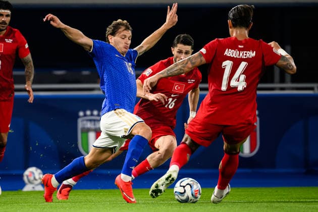 Nicolo Barella of Italy, Ismail Yuksek and Abdulkerim Bardakci of Turkiye compete for the ball during the Nations League football match between Italy and Turkiye at Renato Dall Ara stadium in Bologna (Italy), October 5, 2026. AndreaxStaccioli