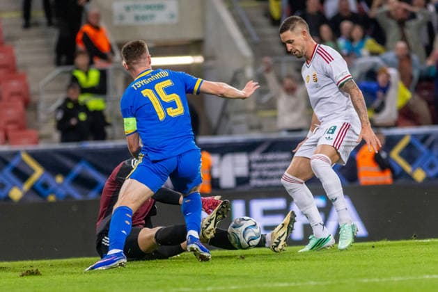 Balazs Toth of Hungary and Blackburn Rovers, Viktor Tsygankov of Ukraine and Ajax Amsterdam and Zsolt Nagy of Hungary and Puskas Akademia during UEFA Nations League League phase game between Ukraine vs Hungary (Dominika Kortvelyesiova Ball Raw Images) Trnava Antona Malatinskeho Stadium Slovakia Copyright: xDominikaxKortvelyesiovax DKOR6150