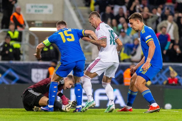 Balazs Toth of Hungary and Blackburn Rovers, Viktor Tsygankov of Ukraine and Ajax Amsterdam and Zsolt Nagy of Hungary and Puskas Akademia during UEFA Nations League League phase game between Ukraine vs Hungary (Dominika Kortvelyesiova Ball Raw Images) Trnava Antona Malatinskeho Stadium Slovakia Copyright: xDominikaxKortvelyesiovax DKOR6155