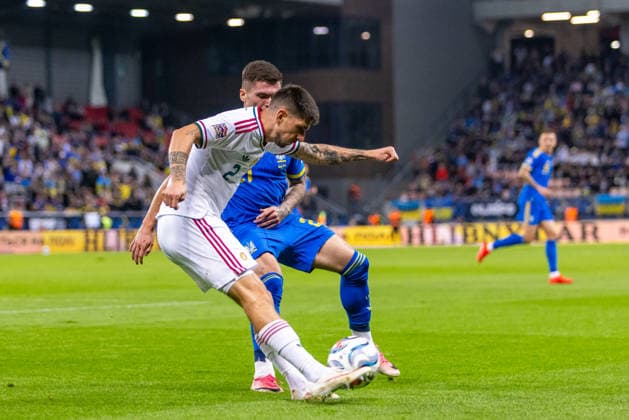 Attila Osvath of Hungary and Ferencvaros and Ihor Krasnopir of Ukraine and Polissya Zhytomyr during UEFA Nations League League phase game between Ukraine vs Hungary (Dominika Kortvelyesiova Ball Raw Images) Trnava Antona Malatinskeho Stadium Slovakia Copyright: xDominikaxKortvelyesiovax DKR_0399