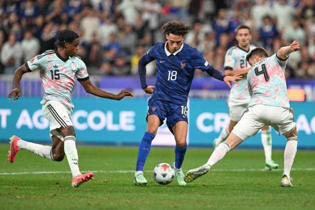 261005 France vs Belgium Nathan Ngoy (15) of Belgium and Brandon Mechele (4) of Belgium defending on Maghnes Akliouche (18) of France during a soccer game between the national teams of France and Belgium on matchday 4 in group A1 in the Nations League , league phase , on Monday 5 October 2026 in Paris , France .(Photo by David Catry Isosport) Paris France  Copyright: xDavidxCatryx 20261005DC2_1103