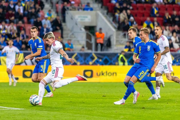 Milan Toth of Hungary and Vasas and Illia Krupskyi of Ukraine and Kharkiv during UEFA Nations League League phase game between Ukraine vs Hungary (Dominika Kortvelyesiova Ball Raw Images) Trnava Antona Malatinskeho Stadium Slovakia Copyright: xDominikaxKortvelyesiovax DKR_0437
