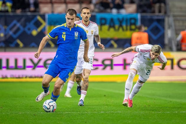 UKRAINE - HUNGARY Taras Mykhavko of Ukraine and Dynamo Kyiv and Milan Toth of Hungary and Vasas during UEFA Nations League - League B - Group B2 - Matchday 4 - football match between Ukraine and Hungary. Anton Malatinsky Stadium, City Arena, Trnava, Slovakia, October 05, 2026. Photo by Branislav Racko Copyright: xx 080A4275
