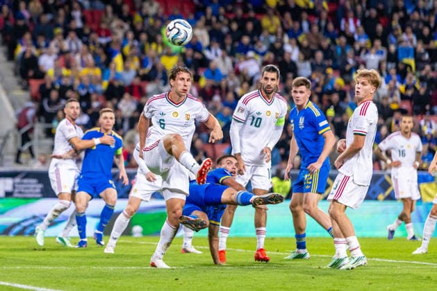 Willi Orban of Hungary and RB Leipzig, Matvii Ponomarenko of Ukraine and Dynamo Kyiv and Dominik Szoboszlai of Hungary and Liverpool during UEFA Nations League League phase game between Ukraine vs Hungary (Dominika Kortvelyesiova Ball Raw Images) Trnava Antona Malatinskeho Stadium Slovakia Copyright: xDominikaxKortvelyesiovax DKR_0418