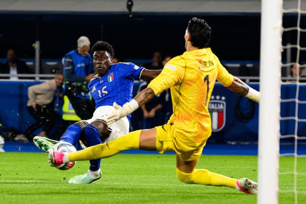 Ugurcan Cakir of Turkiye saves on Issa Doumbia of Italy during the Nations League football match between Italy and Turkiye at Renato Dall Ara stadium in Bologna (Italy), October 5, 2026. AndreaxStaccioli