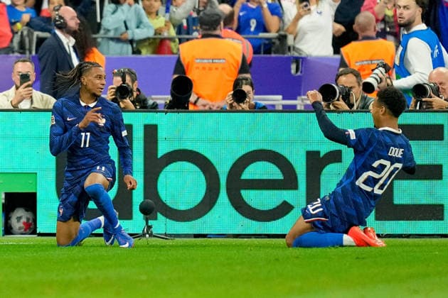Michael Olise (France) celebrates after scoring his team s third goal with Desire Doue (France) during the UEFA Nations League 2026 27 group phase match between France and Belgium at Stade de France on October 5, 2026 in Paris, France. (Photo by Alex Gottschalk DeFodi Images) -