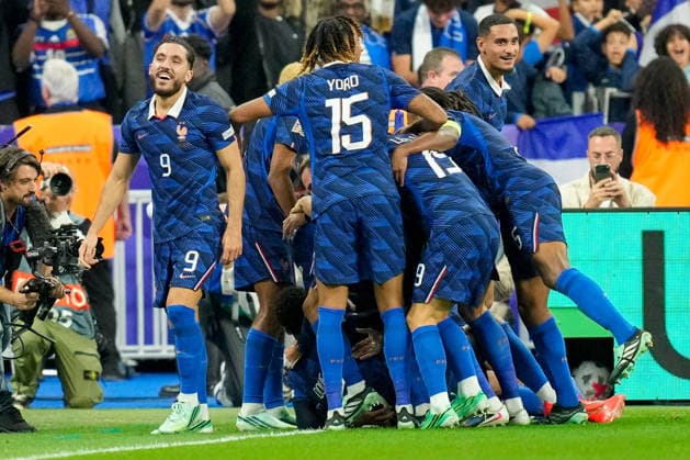 Michael Olise (France) celebrates after scoring his team s third goal with teammates during the UEFA Nations League 2026 27 group phase match between France and Belgium at Stade de France on October 5, 2026 in Paris, France. (Photo by Alex Gottschalk DeFodi Images) -