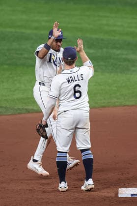 October 5, 2026, St. Petersburg, Florida, USA: Tampa Bay Rays shortstop TAYLOR WALLS (6) and left fielder CHANDLER SIMPSON (14) celebrate after a win against the New York Yankees in game 2 of the American League Division Series. The Tampa Bay Rays hosted the New York Yankees the at Tropicana Field in St. Petersburg, FL. MLB, Baseball Herren, USA 2026: Tampa Bay Rays 5:2 New York Yankees  - ZUMAm299 20261005_znp_m299_016 Copyright: xTaylorxMcFeex