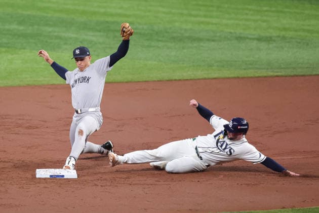 October 5, 2026, St. Petersburg, Florida, USA: New York Yankees shortstop GEORGE LOMBARD JR. (96) reaches towards second base for a double play during game 2 of the American League Division Series against the Tampa Bay Rays. The Tampa Bay Rays hosted the New York Yankees the at Tropicana Field in St. Petersburg, FL. St. Petersburg USA - ZUMAm299 20261005_znp_m299_028 Copyright: xTaylorxMcFeex