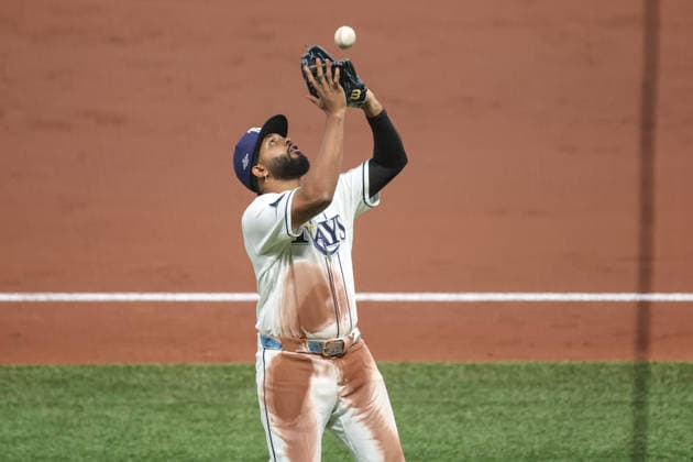 October 5, 2026, St. Petersburg, Florida, USA: Tampa Bay Rays third baseman JUNIOR CAMINERO (13) catches a ball in foul territory during game 2 of the American League Division Series against the New York Yankees. The Tampa Bay Rays hosted the New York Yankees the at Tropicana Field in St. Petersburg, FL. MLB, Baseball Herren, USA 2026: Tampa Bay Rays 5:2 New York Yankees  - ZUMAm299 20261005_znp_m299_034 Copyright: xTaylorxMcFeex