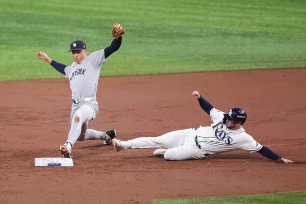 October 5, 2026, St. Petersburg, Florida, USA: New York Yankees shortstop GEORGE LOMBARD JR. (96) reaches towards second base for a double play during game 2 of the American League Division Series against the Tampa Bay Rays. The Tampa Bay Rays hosted the New York Yankees the at Tropicana Field in St. Petersburg, FL. MLB, Baseball Herren, USA 2026: Tampa Bay Rays 5:2 New York Yankees  - ZUMAm299 20261005_znp_m299_044 Copyright: xTaylorxMcFeex