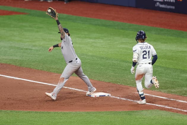 October 5, 2026, St. Petersburg, Florida, USA: New York Yankees first baseman LUIS GARCoÂA JR. (26) catches the ball at first base for an out during game 2 of the American League Division Series against the Tampa Bay Rays. The Tampa Bay Rays hosted the New York Yankees the at Tropicana Field in St. Petersburg, FL. St. Petersburg USA - ZUMAm299 20261005_znp_m299_043 Copyright: xTaylorxMcFeex