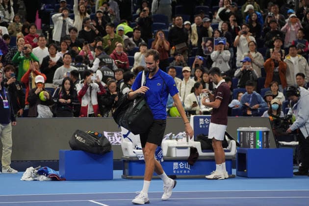 (261006) -- BEIJING, Oct. 6, 2026 -- Daniil Medvedev (L) leaves the court after the men s singles semifinal match between Daniil Medvedev of Russia and Novak Djokovic of Serbia at 2026 China Open tennis tournament in Beijing, China, Oct. 5, 2026. ) (SP)CHINA-BEIJING-TENNIS-CHINA OPEN-MEN S SINGLES(CN) XiexHan 
