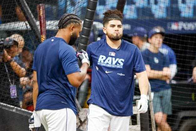 October 5, 2026, St. Petersburg, Florida, USA: Tampa Bay Rays first baseman Jonathan Aranda 8 finishes taking batting practice, while third baseman Junior Caminero 13 comes up to swing ahead of a game against the New York Yankees at Tropicana Field on Monday, Oct. 5, 2026, in St. Petersburg. St. Petersburg USA  - ZUMAs70_ 20261005_zan_s70_004 Copyright: xJeffereexWoox Florida News - October 5, 2026  - ZUMA0868 0868658855st Copyright: xIMAGO JeffereexWoox