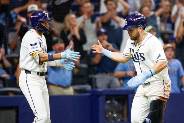 October 5, 2026, St. Petersburg, Florida, USA: Tampa Bay Rays first baseman Jonathan Aranda (8) receives a high-five from left fielder Chandler Simpson (14), after he scores against at home plate against the New York Yankees during the fifth inning at Tropicana Field on Monday, Oct. 5, 2026, in St. Petersburg. Florida News - October 5, 2026  - ZUMAs70_ 0868675357st Copyright: xJeffereexWoox