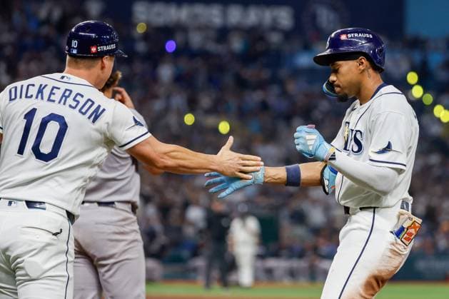 October 5, 2026, St. Petersburg, Florida, USA: Tampa Bay Rays left fielder Chandler Simpson (14) receives a high-five from first base coach Corey Dickerson (10), after he reaches first base against New York Yankees during the fifth inning at Tropicana Field on Monday, Oct. 5, 2026, in St. Petersburg. Florida News - October 5, 2026  - ZUMAs70_ 0868675372st Copyright: xJeffereexWoox