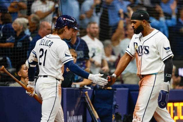 October 5, 2026, St. Petersburg, Florida, USA: Tampa Bay Rays third baseman Junior Caminero (13) receives a high-five from center fielder Jonny DeLuca (21) after he scores against the New York Yankees during the fifth inning at Tropicana Field on Monday, Oct. 5, 2026, in St. Petersburg. Florida News - October 5, 2026  - ZUMAs70_ 0868675597st Copyright: xJeffereexWoox