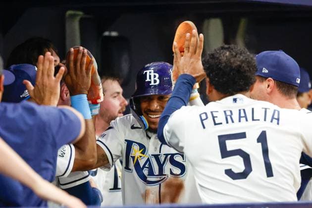 October 5, 2026, St. Petersburg, Florida, USA: Tampa Bay Rays left fielder Chandler Simpson (14) receives high-fives from teammates, after he scores at home plate against the New York Yankees during the fifth inning at Tropicana Field on Monday, Oct. 5, 2026, in St. Petersburg. Florida News - October 5, 2026  - ZUMAs70_ 0868675641st Copyright: xJeffereexWoox
