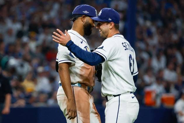 October 5, 2026, St. Petersburg, Florida, USA: Tampa Bay Rays pitcher Ian Seymour (61) smiles and thanks third baseman Junior Caminero (13), after he catches a pop fly hit by New York Yankees left fielder Cody Bellinger (35) for an out during the eighth inning at Tropicana Field on Monday, Oct. 5, 2026, in St. Petersburg. Florida News - October 5, 2026  - ZUMAs70_ 0868677816st Copyright: xJeffereexWoox