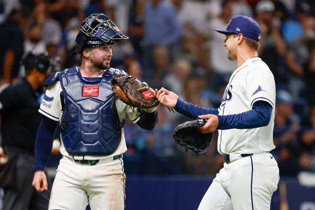 October 5, 2026, St. Petersburg, Florida, USA: Tampa Bay Rays catcher Liam Hicks (34) gives a fist bump to pitcher Ian Seymour (61), after he retires the New York Yankees during the eighth inning at Tropicana Field on Monday, Oct. 5, 2026, in St. Petersburg. Florida News - October 5, 2026  - ZUMAs70_ 0868677826st Copyright: xJeffereexWoox