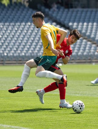 Australia Vs Korea Republic in Gosford - 06 Oct 2026 Medin Merneti (front) of Australia football team and Kwon Gimin (back) of Korea Republic football team seen in action during the U23 International Friendlies match between Australia and Korea Republic held at polytec Stadium. Final score; Australia 2:2 Korea Republic. Gosford Australia Copyright: xLuisxVeniegrax xSOPAxImagesx 20261006_FAIF_LuisVeniegra4608
