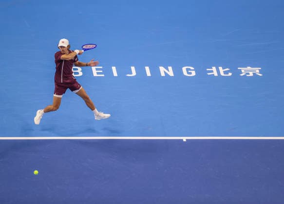 (261006) -- BEIJING, Oct. 6, 2026 -- Alex de Minaur of Australia hits a return during the men s singles final match against Novak Djokovic of Serbia at 2026 China Open tennis tournament in Beijing, China, Oct. 6, 2026. (Photo by Xinhua) (SP)CHINA-BEIJING-TENNIS-CHINA OPEN-MEN S SINGLES-FINAL(CN) MaxZihan 