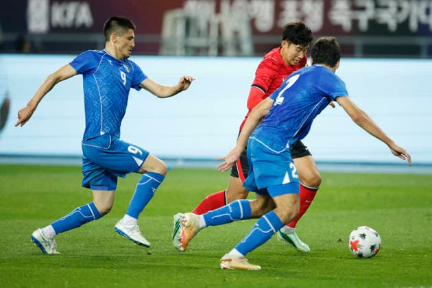 South Korea v Uzbekistan - Friendly Match Son Heung Min of South Korea and Abduqodir Husanov and Odil Khamrobekov of Uzbekistan compete during the International Friendly, Länderspiel, Nationalmannschaft Match presented by Hana Bank between South Korea and Uzbekistan at Mireu Stadium in Yongin, South Korea, on October 6, 2026. Yongin GYEONGGI South Korea  Copyright: xSeung-ilxRyux originalFilename:ryu-football261006_npVMz.jpg