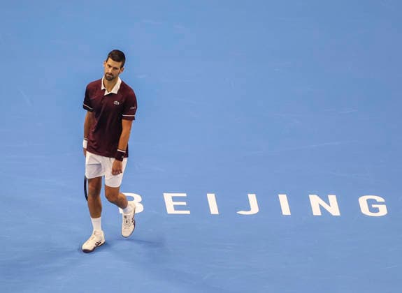 (261006) -- BEIJING, Oct. 6, 2026 -- Novak Djokovic of Serbia reacts during the men s singles final match against Alex de Minaur of Australia at 2026 China Open tennis tournament in Beijing, China, Oct. 6, 2026. (Photo by Xinhua) (SP)CHINA-BEIJING-TENNIS-CHINA OPEN-MEN S SINGLES-FINAL(CN) MaxZihan 