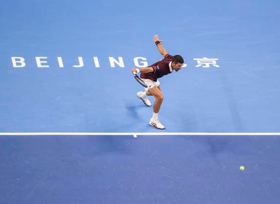 (261006) -- BEIJING, Oct. 6, 2026 -- Novak Djokovic of Serbia hits a return during the men s singles final match against Alex de Minaur of Australia at 2026 China Open tennis tournament in Beijing, China, Oct. 6, 2026. (Photo by Xinhua) (SP)CHINA-BEIJING-TENNIS-CHINA OPEN-MEN S SINGLES-FINAL(CN) MaxZihan 