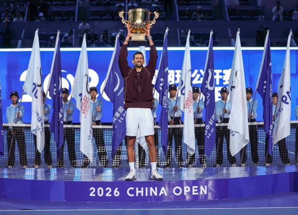 (261006) -- BEIJING, Oct. 6, 2026 -- Novak Djokovic of Serbia holds up the champion trophy during the awarding ceremony for the men s singles final at 2026 China Open tennis tournament in Beijing, China, Oct. 6, 2026. ) (SP)CHINA-BEIJING-TENNIS-CHINA OPEN-MEN S SINGLES-AWARDING CEREMONY(CN) BaixXuefei 