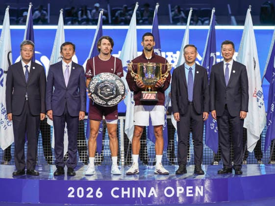 (261006) -- BEIJING, Oct. 6, 2026 -- Winner Novak Djokovic (3rd R) of Serbia and runner-up Alex de Minaur (3rd L) of Australia pose for photos during the awarding ceremony for the men s singles final at 2026 China Open tennis tournament in Beijing, China, Oct. 6, 2026. ) (SP)CHINA-BEIJING-TENNIS-CHINA OPEN-MEN S SINGLES-AWARDING CEREMONY(CN) BaixXuefei 
