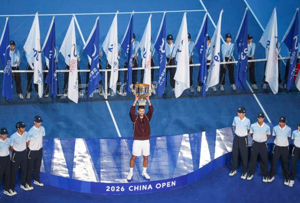 (261006) -- BEIJING, Oct. 6, 2026 -- Novak Djokovic of Serbia holds up the champion trophy during the awarding ceremony for the men s singles final at 2026 China Open tennis tournament in Beijing, China, Oct. 6, 2026. (Photo by Xinhua) (SP)CHINA-BEIJING-TENNIS-CHINA OPEN-MEN S SINGLES-AWARDING CEREMONY(CN) MaxZihan 