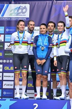 Second placed Team Italy celebrates on the podium of the time trial mixed relay elite race (44,2 km) at the cycling UEC Road European Championships, in Ljubljana, Slovenia Tuesday 6 October 2026. The UEC Road European Championships are taking place from 02 to 07 October in Ljubljana, Slovenia. DAVIDxPINTENS  x188934779x