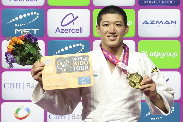 AZERBAIJAN, BAKU - OCTOBER 6, 2026: Ryuga Tanaka of Japan poses with his gold medal in the men’s -73 kg category at the National Gymnastics Arena during the awards ceremony at the 2026 World Judo Championships. Mikhail Sinitsyn TASS  98874958