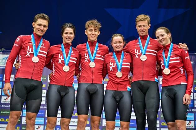 Third placed Team Luxembourg celebrates on the podium of the time trial mixed relay elite race (44,2 km) at the cycling UEC Road European Championships, in Ljubljana, Slovenia Tuesday 6 October 2026. The UEC Road European Championships are taking place from 02 to 07 October in Ljubljana, Slovenia. DAVIDxPINTENS  x188946459x