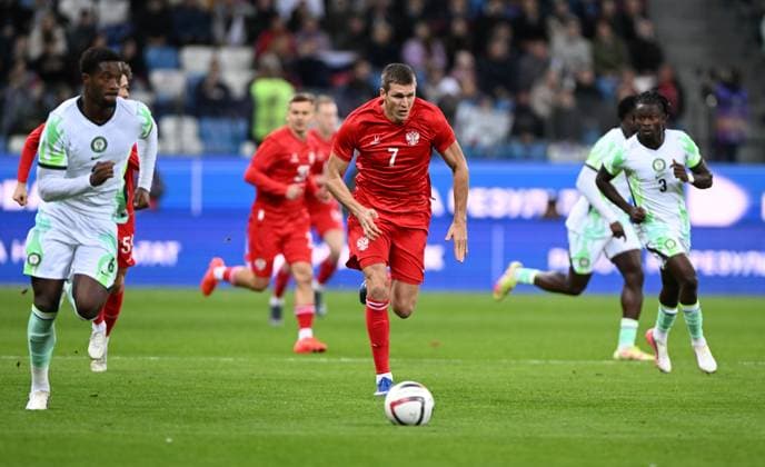 Russia Soccer Friendly Russia - Nigeria 9258732 06.10.2026 Nigeria s Emmanuel Fernandez, Russia s Aleksandr Sobolev and Nigeria s Isaac James struggle for the ball during the friendly soccer match between Russia and Nigeria at Sovcombank Arena in Nizhny Novgorod, Russia. Maksim Blinov Sputnik Nizhny Novgorod Russia  Copyright: xMaksimxBlinovx