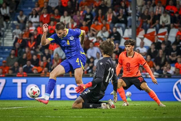 DOETINCHEM , 06-10-2026 , Stadion De Vijverberg , season 2026 2027 , EURO U21, U 21 Qualification football , match between Netherlands U21 and Bosnia and Herzegovina U21 , picture shows Bosnia and Herzegovina player Nidal Celik and Netherlands player Thom Van Bergen, Bosnia and Herzegovina goalkeeper Amil Siljevic Netherlands U21 - Bosnia and Herzegovina U21  x207980798x Copyright: