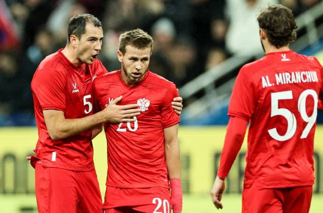 RUSSIA, NIZHNY NOVGOROD - OCTOBER 6, 2026: Russia s Maxim Osipenko, Lechi Sadulayev and Alexei Miranchuk (L-R) celebrate a goal in a football friendly match Russia vs Nigeria at Nizhny Novgorod Stadium (Sovcombank Arena). Sergei Savostyanov TASS  98876889