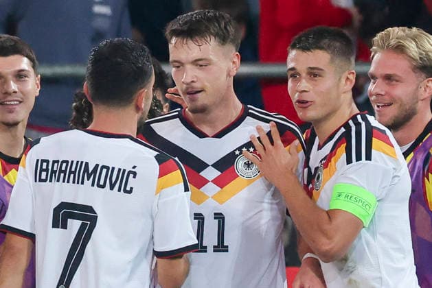 Dzenan Pejcinovic (Germany) celebrates after scoring his teams second goal with Arijon Ibrahimovic (Germany) and Nicolo Tresoldi (Germany) during the UEFA Under21 EURO Qualifier, EM, Europameisterschaft between Germany U21, U 21 and Georgia U21 at Almstadion on October 6, 2026 in Bielefeld, Germany. (Photo by Marco Steinbrenner DeFodi Images) -