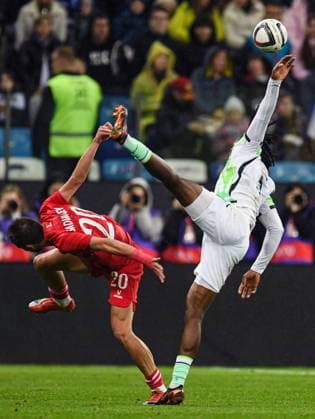 Russia Soccer Friendly Russia - Nigeria 9258789 06.10.2026 Russia s Lechi Sadulaev and Nigeria s Benjamin Fredrick struggle for the ball during the friendly soccer match between Russia and Nigeria at Sovcombank Arena in Nizhny Novgorod, Russia. Grigoriy Sokolov Sputnik Nizhny Novgorod Russia  Copyright: xGrigoriyxSokolovx