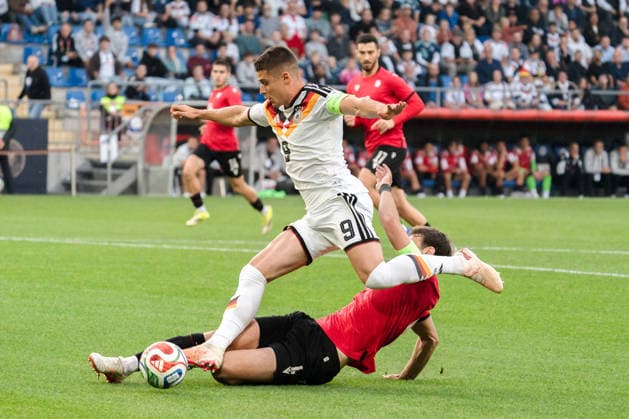 Deutschland: U21, U 21 EM-Qualifikation 2026 2027, Deutschland U21 vs. Georgien U21, Nationalmannschaft, DFB Länderspiel Dienstag 27.03.2026, Schüco Arena, Bielefeld Nicolo Tresoldi Aleksandre Narimanidze Copyright: xCelinaxLeiersx