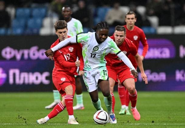 Russia Soccer Friendly Russia - Nigeria 9258797 06.10.2026 Russia s Kirill Glebov, Nigeria s Chibuzo Nwoko and Russia s Danil Krugovoy struggle for the ball during the friendly soccer match between Russia and Nigeria at Sovcombank Arena in Nizhny Novgorod, Russia. Maksim Blinov Sputnik Nizhny Novgorod Russia  Copyright: xMaksimxBlinovx
