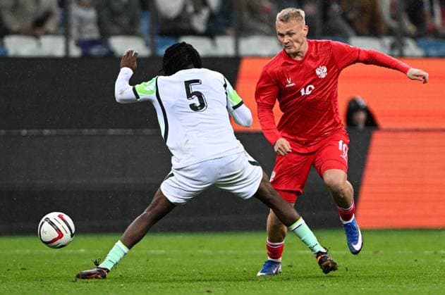Russia Soccer Friendly Russia - Nigeria 9258803 06.10.2026 Nigeria s Benjamin Fredrick and Russia s Konstantin Tyukavin struggle for the ball during the friendly soccer match between Russia and Nigeria at Sovcombank Arena in Nizhny Novgorod, Russia. Maksim Blinov Sputnik Nizhny Novgorod Russia  Copyright: xMaksimxBlinovx