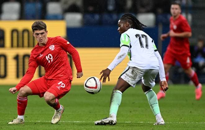 Russia Soccer Friendly Russia - Nigeria 9258806 06.10.2026 Russia s Kirill Glebov and Nigeria s Chibuzo Nwoko struggle for the ball during the friendly soccer match between Russia and Nigeria at Sovcombank Arena in Nizhny Novgorod, Russia. Maksim Blinov Sputnik Nizhny Novgorod Russia  Copyright: xMaksimxBlinovx