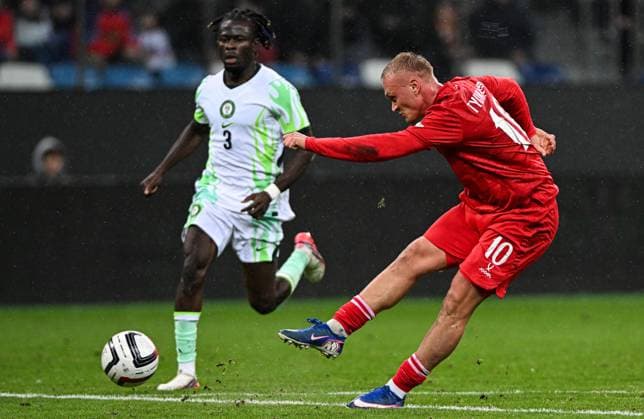 Russia Soccer Friendly Russia - Nigeria 9258820 06.10.2026 Nigeria s Isaac James closes in as Russia s Konstantin Tyukavin shoots the ball during the friendly soccer match between Russia and Nigeria at Sovcombank Arena in Nizhny Novgorod, Russia. Maksim Blinov Sputnik Nizhny Novgorod Russia  Copyright: xMaksimxBlinovx