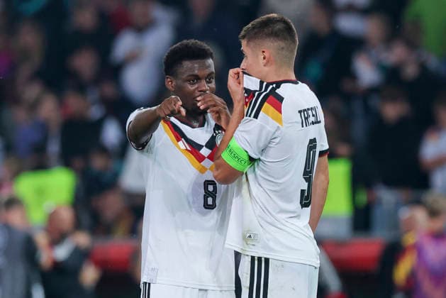 Noel Aseko (Germany) und Nicolo Tresoldi (Germany) talk together during the UEFA Under21 EURO Qualifier, EM, Europameisterschaft between Germany U21, U 21 and Georgia U21 at Almstadion on October 6, 2026 in Bielefeld, Germany. (Photo by Marco Steinbrenner DeFodi Images) -